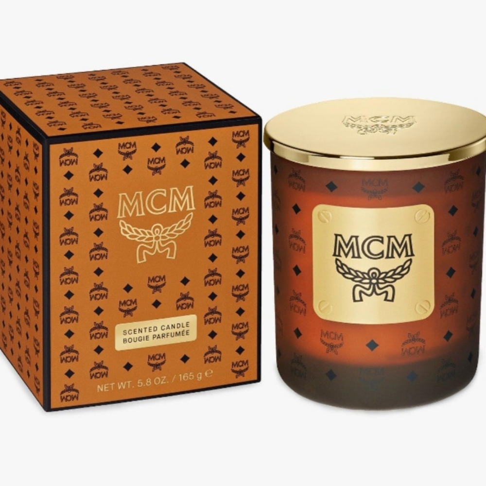 MCM SCENTED CANDLE new, priced for 3